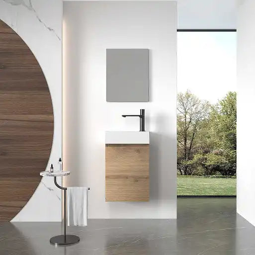 A modern bathroom vanity with a black faucet, white sink, and light wood cabinet.